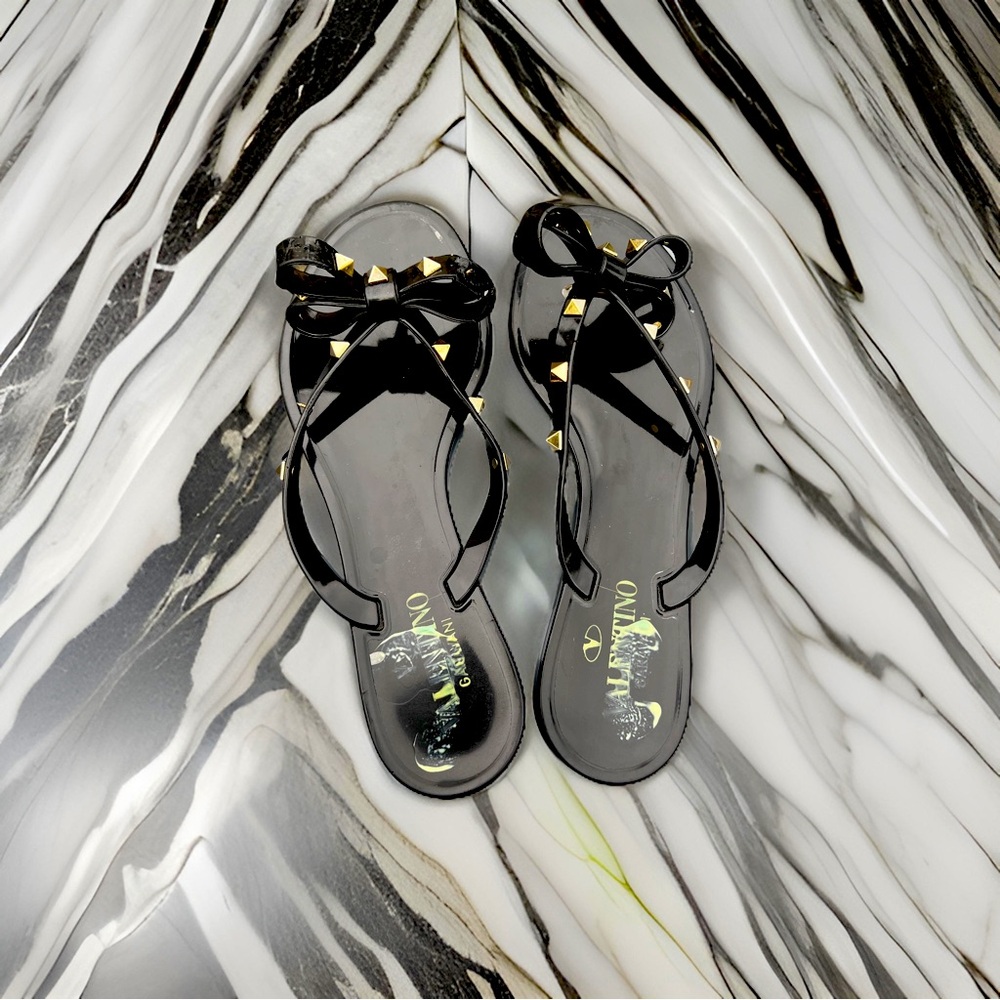 Valentino Rockstud leather sandals with bow